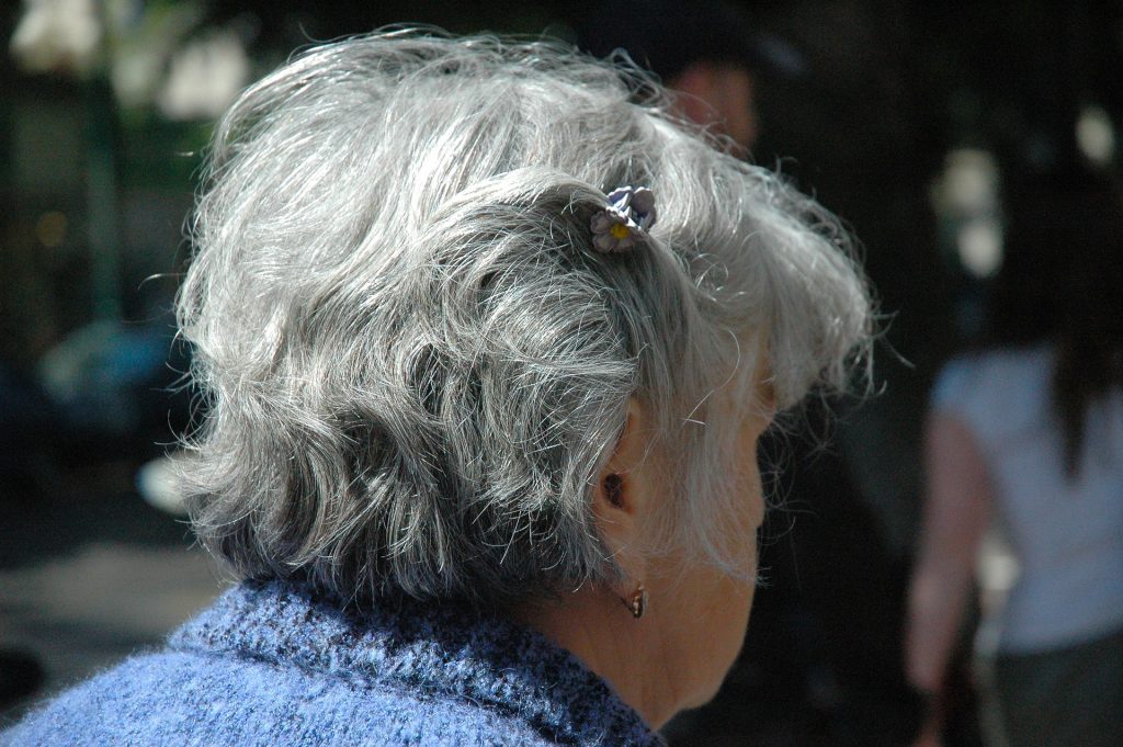 Grey hair is commonly associated with very old women